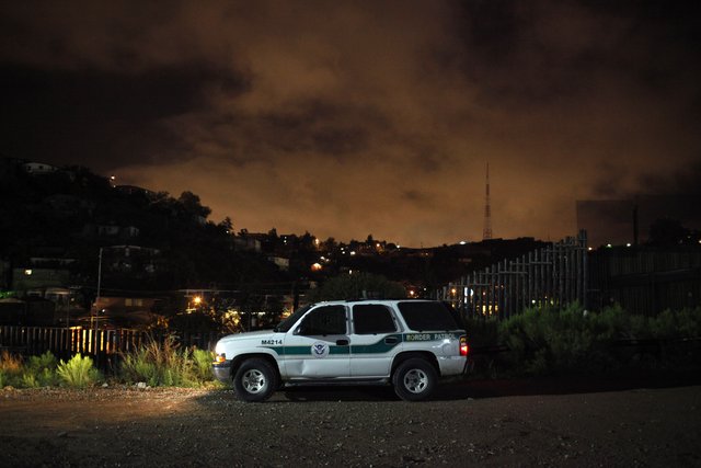 ** FILE ** A U.S. Border Patrol vehicle sits along the U.S.-Mexico border in Nogales, Ariz., on Tuesday, July 27, 2010. (AP Photo/Jae C. Hong, File)